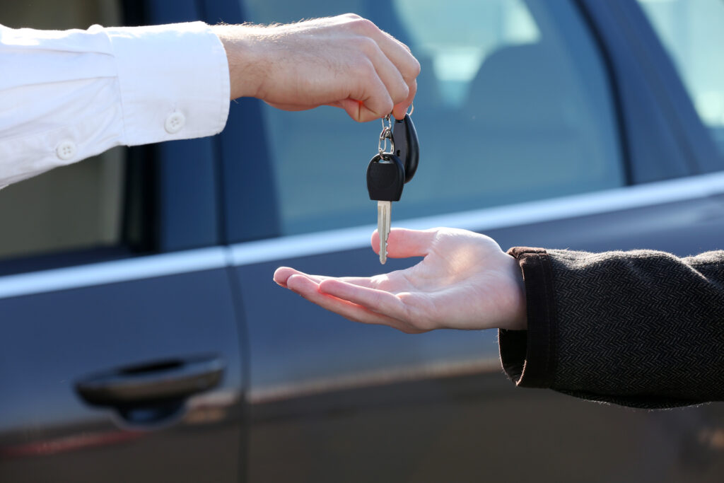 man buying a car, ownership transfer